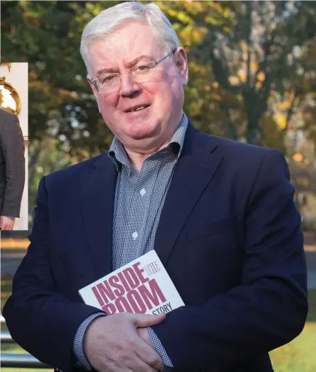  ??  ?? Former Tánaiste Eamon Gilmore with his new book. Above left: Mr Gilmore with German politician Peer Steinbruck on his visit to Dublin in 2013. Photos: Photocall/Fergal Phillips