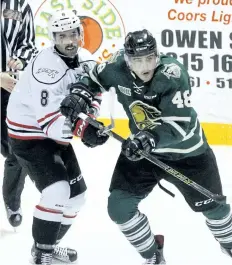  ?? SUPPLIED ?? Forward Sam Miletic, right, shown competing for London in OHL action versus Owen Sound in this November 2016 file photo, is the newest member of the Niagara IceDogs.