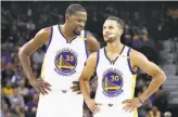  ?? Ezra Shaw / Getty Images ?? Kevin Durant (left) has won four NBA scoring titles. Stephen Curry was last season’s leader.