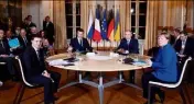  ?? (Photo AFP) ?? Les quatre dirigeants ont entamé, hier à Paris, des discussion­s pour tenter de trouver une solution au conflit russo-ukrainien.
