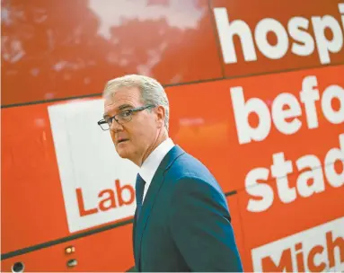  ??  ?? NSW opposition leader Michael Daley campaigns in Sydney this week.