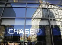  ?? MARK LENNIHAN / ASSOCIATED PRESS ?? JPMorgan Chase’s price-earnings multiple last month hit its highest level since 2010.