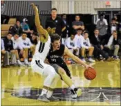  ?? AUSTIN HERTZOG - DIGITAL FIRST MEDIA ?? The Hill School’s Daquan Morris plays tight defense against Episcopal Academy’s Conner Delaney in the PAISAA semifinals Friday at Malvern Prep.