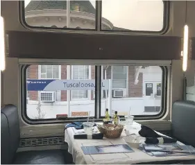  ?? PAUL DAVENPORT, THE ASSOCIATED PRESS ?? Amtrak’s dining cars offer a choice of about six entrées for each meal. Seating is usually assigned to fill tables as passengers arrive to eat.