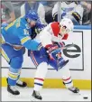  ??  ?? St Louis Blues’ Jay Bouwmeeste­r (19) battles for the puck with Montreal Canadiens’ Jordan Weal (43) during the period of an NHL hockey game on Oct 19 in St Louis. (AP)