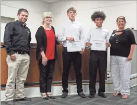  ?? kevin Myrick ?? SkillsUSA winners Josh Cole and Wesley Culberson were joined by their instructor Corey Smith, Board of Education Vice Chair Kristy Gober, and Superinten­dent Laurie Atkins in honors on May 7.