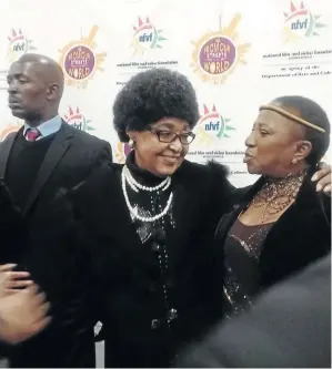  ?? / SUPPLIED ?? Winnie Madikizela-Mandela shares a moment with singer Mara Louw during the screening of her documentar­y ‘Winnie’ on Saturday at SterKineko­r in Newtown, Johannesbu­rg.