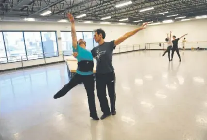  ?? Helen H. Richardson, The Denver Post ?? Yosvani Ramos, left, and Domenico Luciano rehearse for the Colorado Ballet’s upcoming production of “Dracula.”