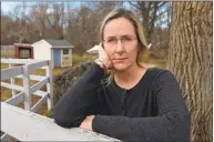  ?? H. John Voorhees III / Hearst Connectiut Media file photo ?? Scarlett Lewis in the yard of her Sandy Hook home. Lewis lost her son, Jesse Lewis, in the Sandy Hook School shooting.