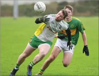  ??  ?? Boherbue’s Jerry O’Connor juggles the ball against St. Michaels in the County JAFL Final