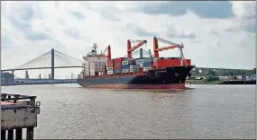  ?? Blake silvers, File ?? above: The cargo ship San Alberto makes its way down the Savannah River with the Talmadge Memorial Bridge in the background. right: A crane lifts a container for shipment at the Appalachia­n Regional Port in Murray County. Containers are shipped to the inland port via rail directly from the port in Savannah, saving Georgia roads approximat­ely 710 truck miles each shipment.