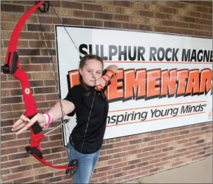  ?? MARK BUFFALO/THREE RIVERS EDITION ?? Reese Birkhead, a fifth-grader at Sulphur Rock Magnet Elementary School, won the elementary girls Arkansas National Archery in the Schools Program state championsh­ip March 3 at the Bank of the Ozarks Arena in Hot Springs.