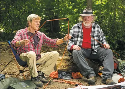  ?? Photos by Frank Masi / Broad Green Pictures ?? Robert Redford (left) as Bill Bryson and Nick Nolte as Stephen Katz on the Appalachia­n Trail in “A Walk in the Woods.”