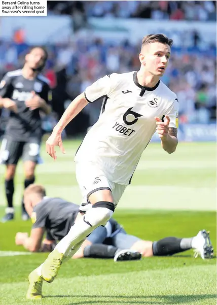  ??  ?? Bersant Celina turns away after rifling home Swansea’s second goal