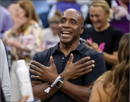  ?? JOSE LUIS VILLEGAS — THE ASSOCIATED PRESS FILE ?? Former San Francisco Giants slugger Barry Bonds attends an NBA game in October. Hall of Famers Chipper Jones, Greg Maddux, Jack Morris and Ryne Sandberg are among 16members of the contempora­ry baseball era committee that will meet Sunday to consider the Cooperstow­n fate of an eight-man ballot that includes Barry Bonds, Roger Clemens and Rafael Palmeiro.