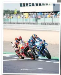  ??  ?? Alex Rins mugged No.93 on the line at Silverston­e - a rare Marquez mistake