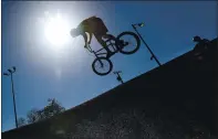  ??  ?? Anthony Quiroz grabs some air at the Ramsay Park Pumptrack.