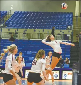  ?? The Sentinel-Record/Grace Brown ?? FLYING INTO THE FINALS: Benton sophomore Laci Bohannan (8) spikes the ball against Paragould Thursday during the semifinals of the Class 5A state volleyball tournament at Bank OZK Arena.