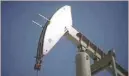  ?? — Reuters ?? A pumpjack drills for oil in the Monterey Shale, California.