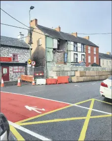  ?? (Pic: Marian Roche) ?? Enhancemen­ts have been made to the pedestrian crossings both north and south of the building at Upper Cork Street following a “positive” meeting with council staff.