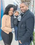  ??  ?? Anthony and Vanessa Mitchell, with their son, Elijah, 2, outside the Daniels FirstHome constructi­on site on Sheppard Ave. E. in Scarboroug­h.