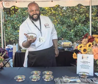  ?? MEMPHIS FOOD AND WINE FESTIVAL ?? More than 70 chefs and vintners will be serving their specialtie­s at the 2021 Memphis Food & Wine Festival. Pictured at the 2019 festival is Phillip Ashley Rix of Memphis-based Phillip Ashley Chocolates.