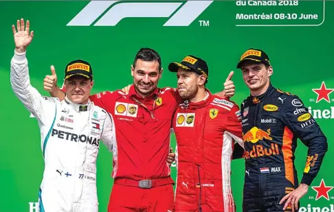  ?? JUN QIAN/JAWA POS ?? PODIUM: Pembalap Ferrari Sebastian Vettel (dua dari kanan) bersama Valtteri Bottas (kiri) dan Max Verstappen (kanan) di Sirkuit Gilles Villeneuve, Montreal, Kanada, dini hari kemarin WIB.