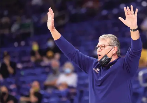  ?? Carmen Mandato / Getty Images ?? UConn coach Geno Auriemma calls out during the first half against Iowa on Saturday.