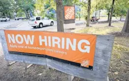  ?? STEVEN SENNE/AP 2020 ?? There is belief that the U.S. economy and job market will strengthen faster than after previous recessions. Above, a help wanted sign at a Home Depot in Boston.