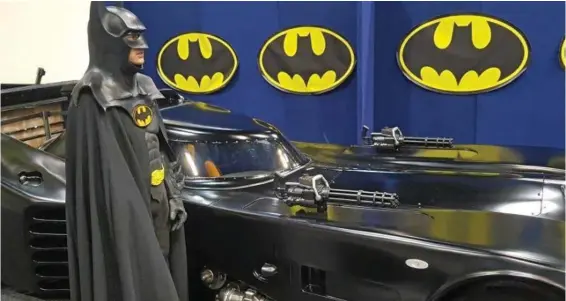  ?? PHOTO: CONTRIBUTE­D ?? ON DISPLAY: Cameron Blackburn dresses at Batman while he poses with his Batmobile at the Supanova Pop Culture Expo.