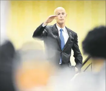  ?? Stuart Palley For The Times ?? “YOU CAN’T TAX EVERYTHING out there and expect people to prosper,” Florida Gov. Rick Scott, a Republican, says at a Valley Industry and Commerce Assn. luncheon Monday in Woodland Park.