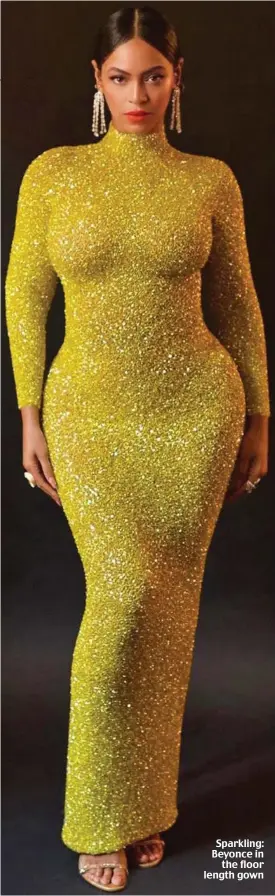  ??  ?? Sparkling: Beyonce in the floor length gown