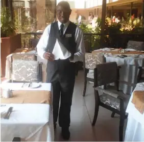  ??  ?? Luke Musengezi is the efficient and friendly head waiter in the Pavilion