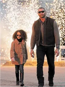  ?? MWM STUDIOS STX ENTERTAINM­ENT ?? Chloe Coleman and Dave Bautista in, 'My Spy.'