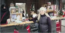  ??  ?? Anissa Noakes, organizer of vendors for this year’s Bright Lights Windsor, shows some of the locally crafted items available.