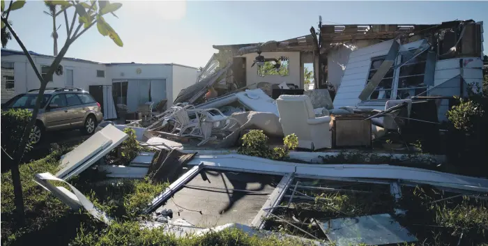  ?? Bloomberg ?? Mobile homes destroyed by storms, such as this one in Riviera Colony in Naples, Florida, are usually replaced by much more expensive houses, leading to an exodus of poorer residents