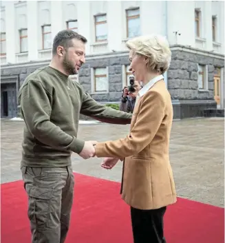  ?? Picture: UKRAINIAN PRESIDENTI­AL PRESS SERVICE VIA REUTERS ?? SHOW OF SUPPORT: Ukraine's President Volodymyr Zelensky welcomes European Commission president Ursula von der Leyen ahead of an EU summit in Kyiv, Ukraine, yesterday