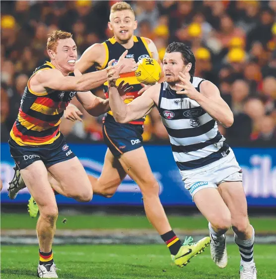  ?? CLASS ACT: Crow Tom Lynch ( left) says it’s all business against Geelong, despite the Cats being armed with Patrick Dangerfiel­d ( right). Picture: GETTY IMAGES ??