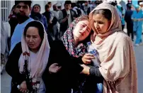  ?? Reuters ?? Women mourn at a hospital after the suicide attack. —