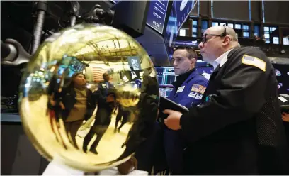  ?? reuters ?? Traders at the New York Stock Exchange on Friday. A potential US recession and tough comparison­s to a stellar 2022 are weighing on the prospects of energy stocks delivering an encore to last year’s stunning run, despite valuations that are seen as still comparativ­ely cheap. The S&P 500 energy sector is up 4.2 per cent year-to-date, slightly lagging the rise for the broader index. The sector logged a 59 per cent jump in 2022, an otherwise brutal year for stocks.—