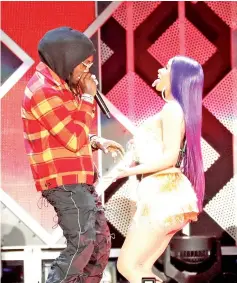  ??  ?? Cardi B and her husband Offset perform during the Jingle Ball concert at The Forum in Inglewood, California, US, last month. — Reuters photos