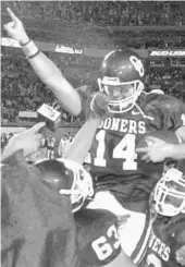  ?? TOM GILBERT/ASSOCIATED PRESS FILE ?? As Oklahoma quarterbac­k, Josh Heupel and the Sooners beat Florida State 13-2 in the 2001 Orange Bowl.