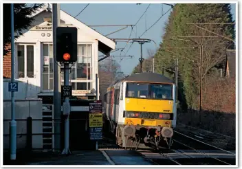  ?? PETER FOSTER ?? Greater Anglia 90001 CrownPoint leaves Stowmarket on January 17, with the 1230 London Liverpool Street-Norwich. Journey times on this route will be improved with the introducti­on of new trains, although this relies upon Network Rail infrastruc­ture...