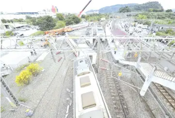  ??  ?? A general view shows the location where the Puyuma Express train derailed in Yilan, eastern Taiwan. — AFP photo