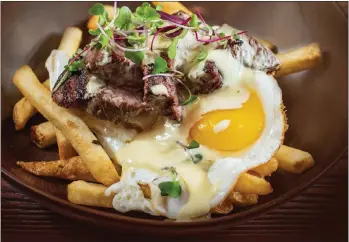  ?? PHOTOS COURTESY OF BLACK ANGUS ?? For its brunch celebratio­n, Black Angus is offering Steak & Eggs, Steak Chilaquile­s, a Steak Breakfast Burrito and a Tomahawak Steak & Eggs for two. It's the first time the restaurant chain has had brunch items on the menu.