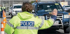  ?? ROSS GIBLIN/STUFF ?? Police cracked down on non-essential travel during Easter weekend. However, mobility data shows Kiwis were generally following the rules.