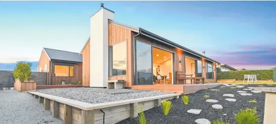  ?? Photo / Supplied ?? This Wharewaka home built by David Reid Homes Taupō has won the Master Builders Bay of Plenty & Central Plateau Supreme House of the Year for homes under $1 million.