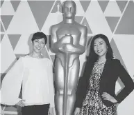  ?? MARK RALSTON / AFP / GETTY IMAGES ?? Bao producer Becky Neiman-cobb, left, and director Domee Shi attend the 91st Annual Academy Awards reception Wednesday for nominated films in the Animated and Live-action Short Film categories.