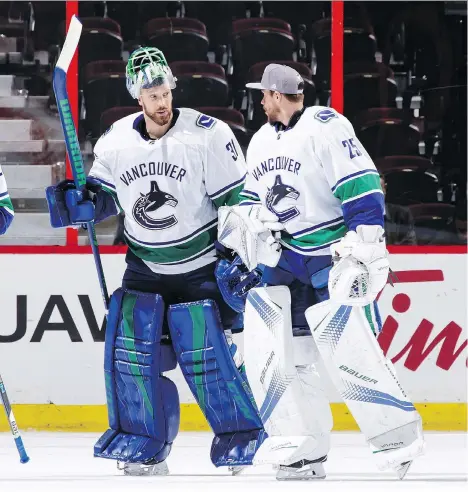  ?? JANA CHYTILOVA/FREESTYLE PHOTOGRAPH­Y/GETTY IMAGES ?? The ongoing battle to become the Canucks’ No. 1 goaltender won’t drive a wedge between good friends Anders Nilsson, left, and Jacob Markstrom. The Swedish compatriot­s are always first to congratula­te each other after a big win.