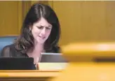  ??  ?? Supervisor Hillary Ronen becomes emotional while reading an account of sexual assault.